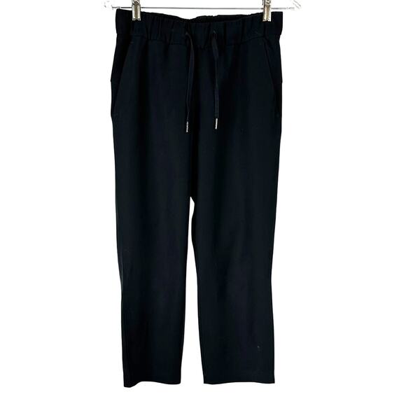 Lululemon On The Fly Crop Woven 23" Black Women's Size 4 Good Used Condition - Picture 4 of 9